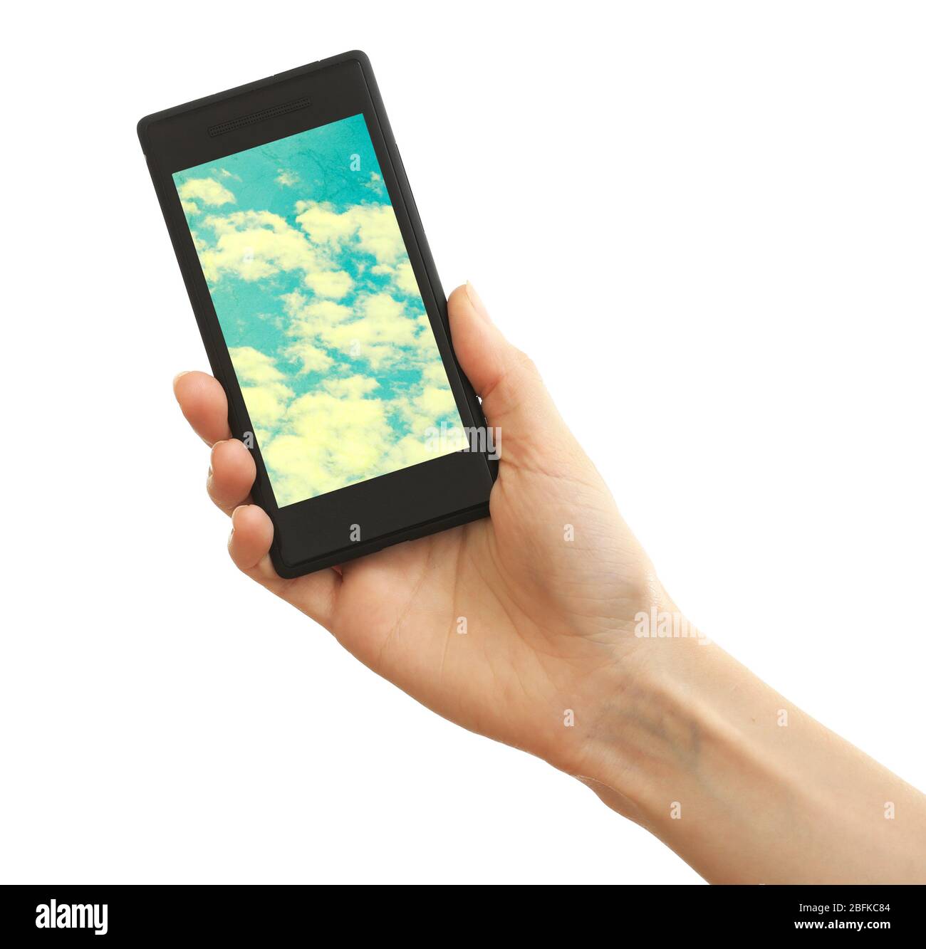 Hand holding mobile smart phone with sky in screen. Cloud computing ...