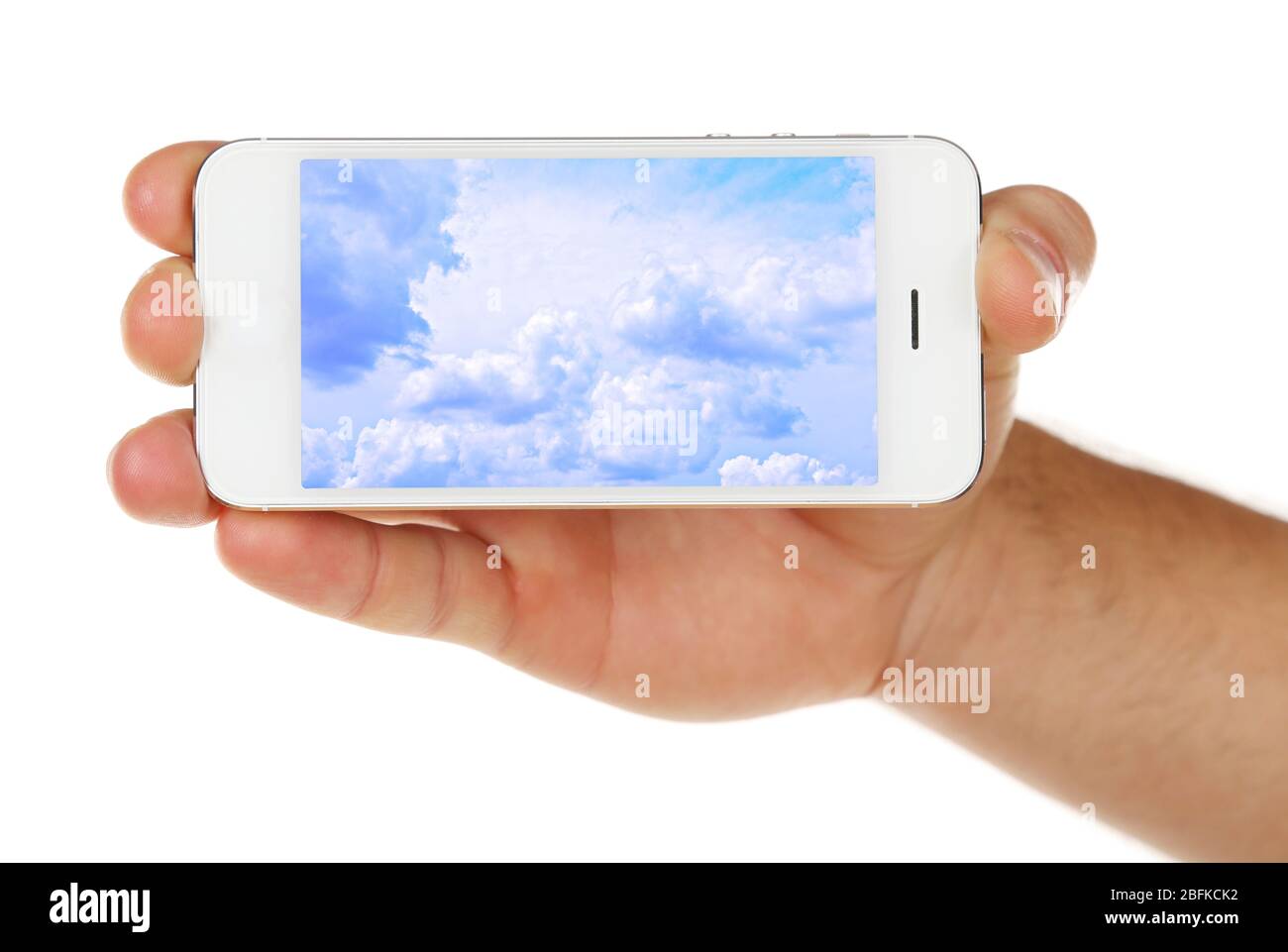 Hand holding mobile smart phone with sky in screen. Cloud computing ...