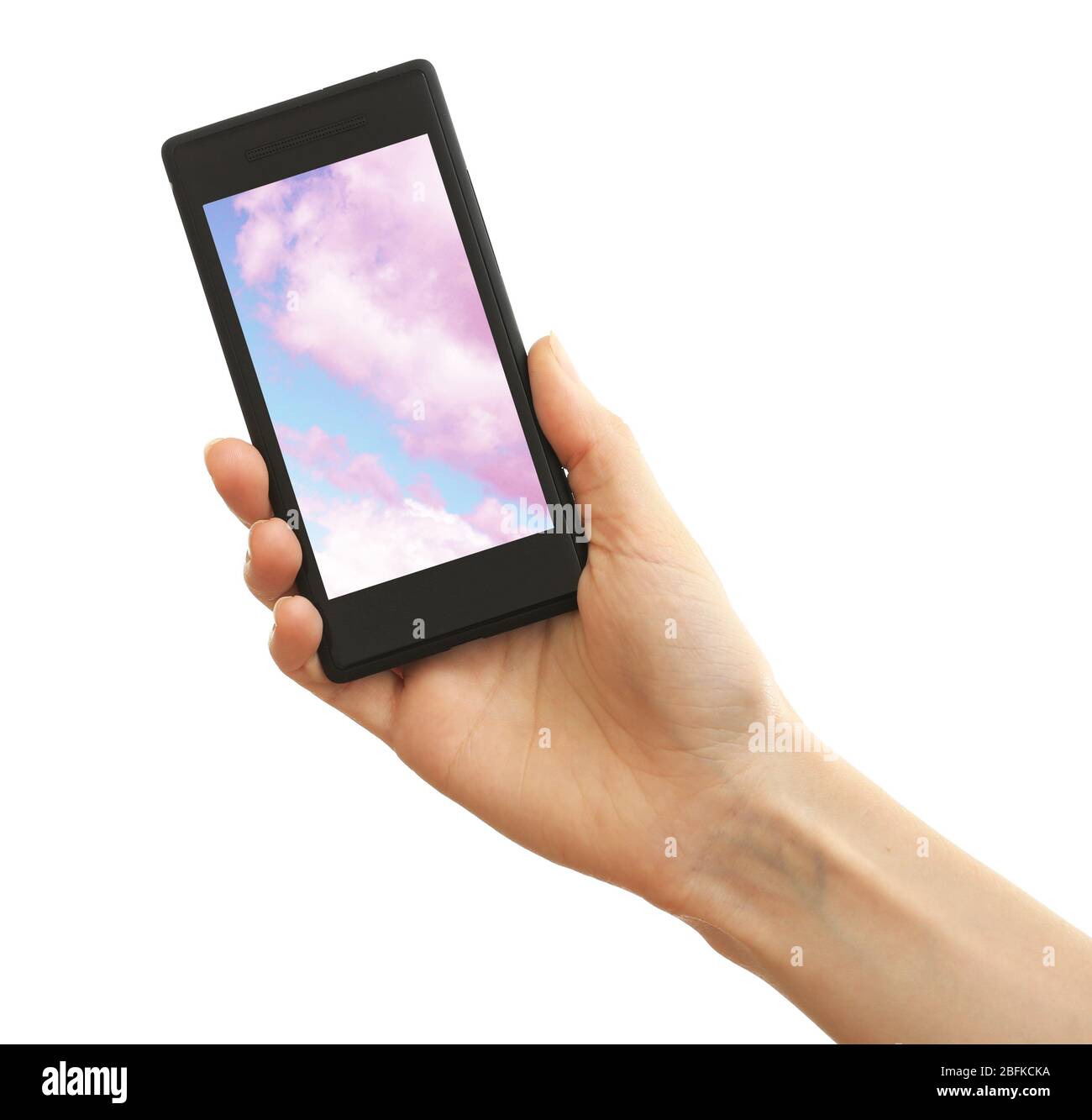 Hand holding mobile smart phone with sky in screen. Cloud computing concept Stock Photo