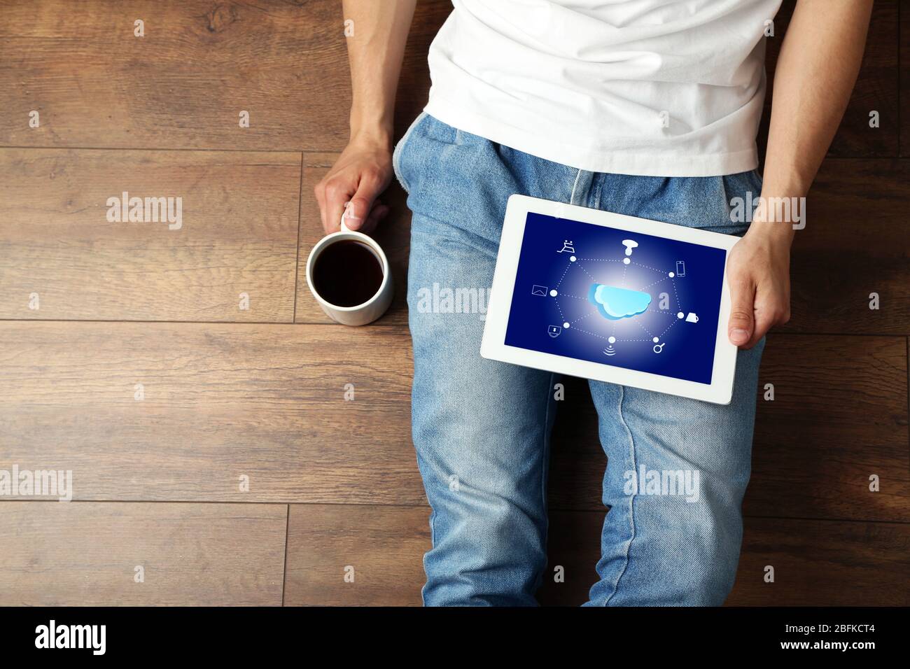 Man with  cloud computing diagram on tablet-pc, modern technology concept Stock Photo