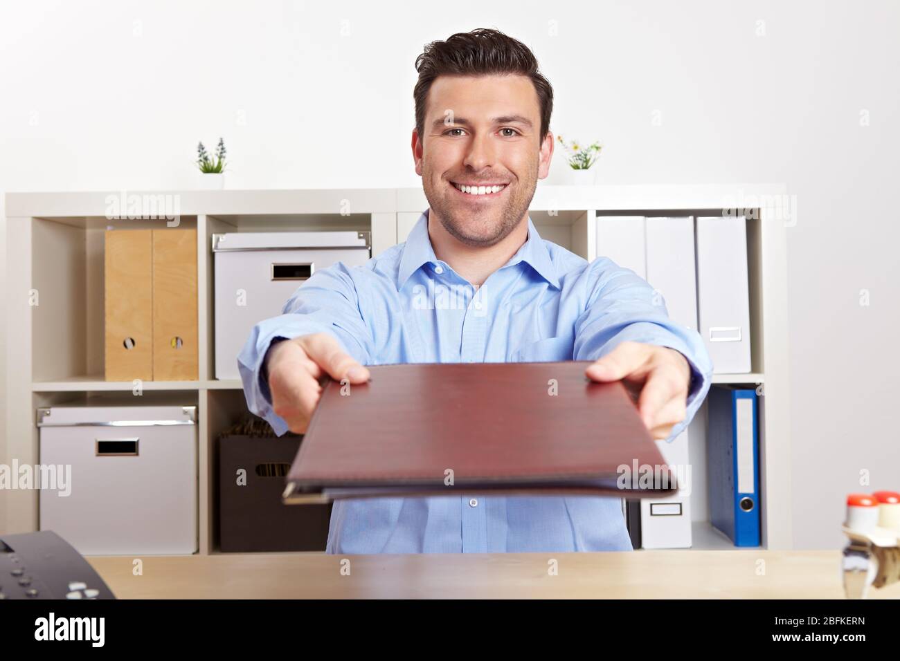 Applicants with application documents during the job interview in the office Stock Photo