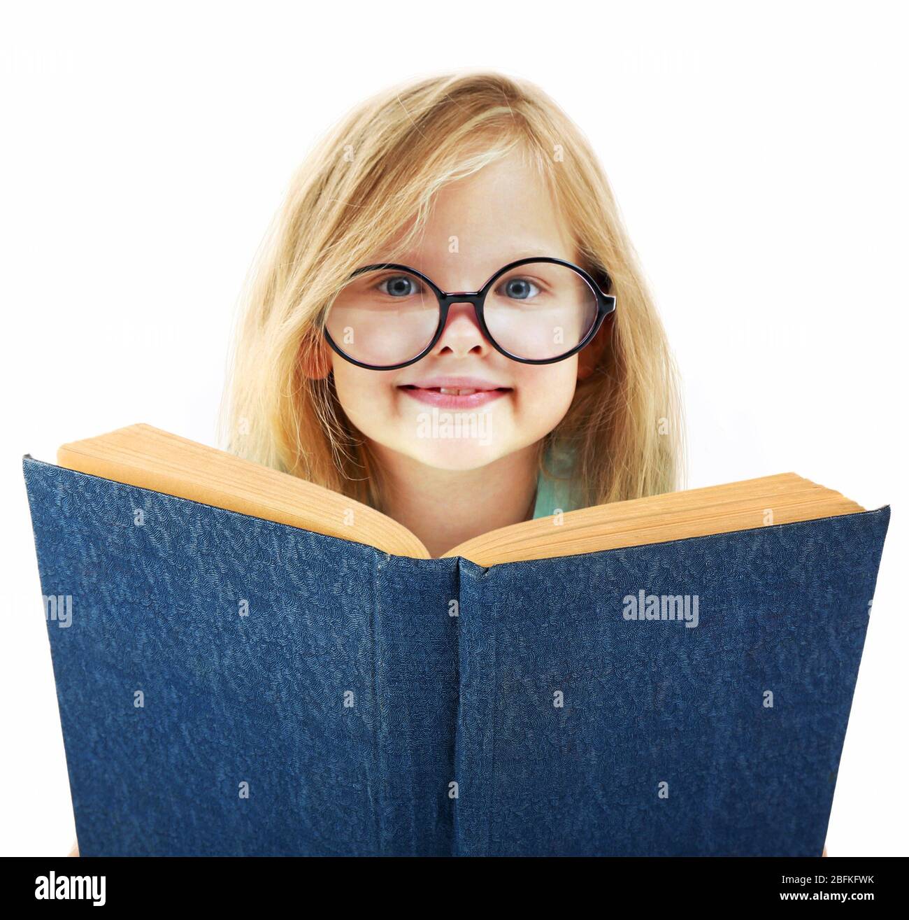Beautiful little girl with book, isolated on white Stock Photo - Alamy