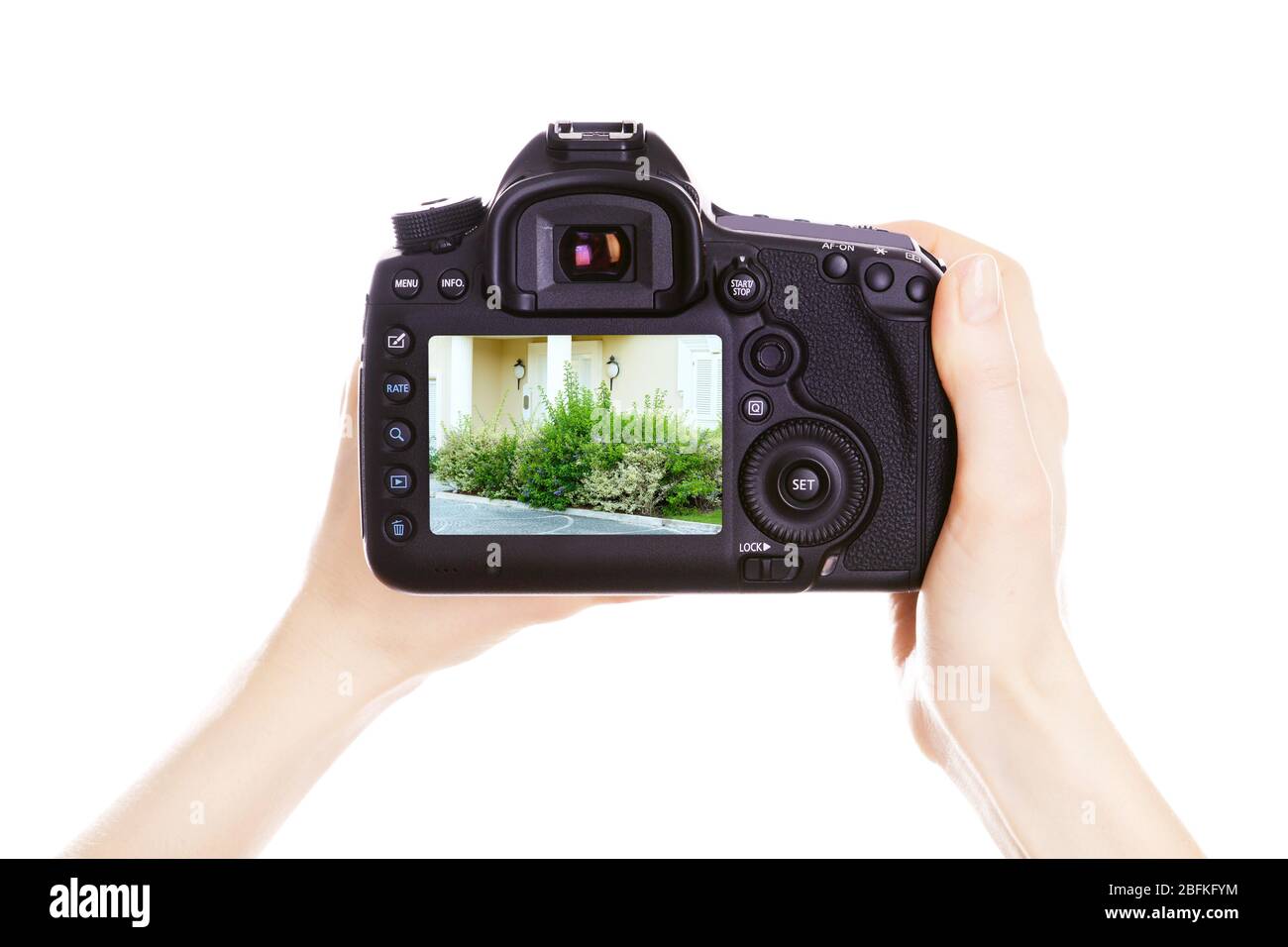 Photographer with camera at work, isolated on white Stock Photo Alamy