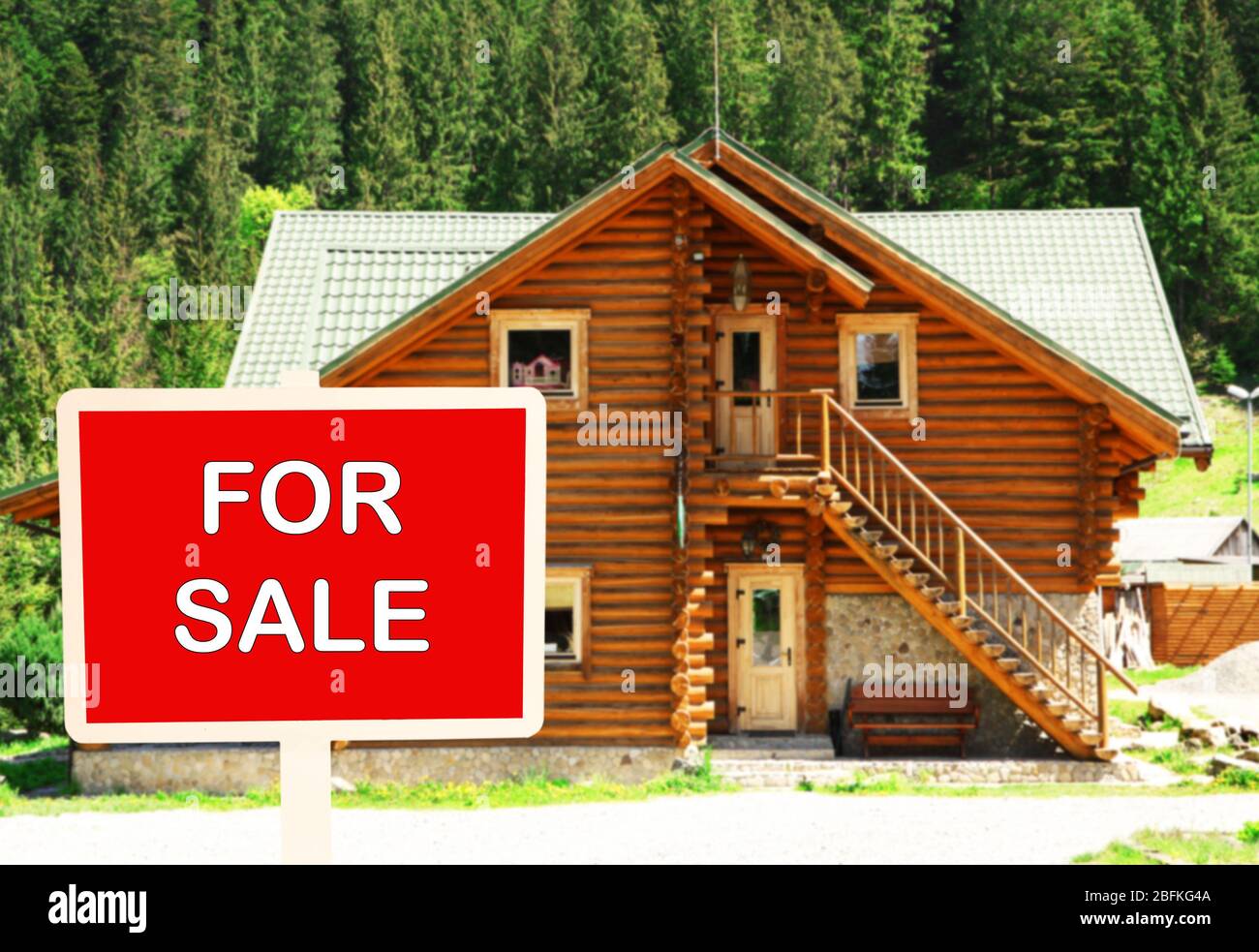 Real estate sign in front of new house for sale Stock Photo - Alamy