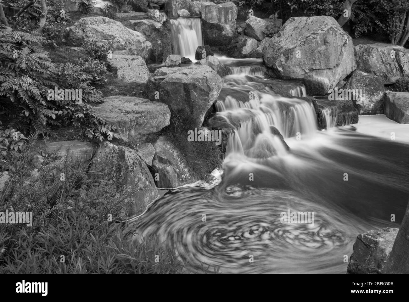Waterfall in Japanese Garden Kyoto Garden, Holland Park, Holland Park Avenue, Kensington, London W11 4UA Stock Photo