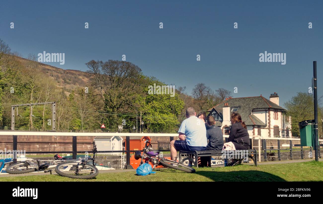 Bowling, Glasgow, Scotland, UK,18h April, 2020: UK Weather: Sunny day saw a busy Forth and Clyde canal at bowling on the firth of river clyde estuary. Stock Photo