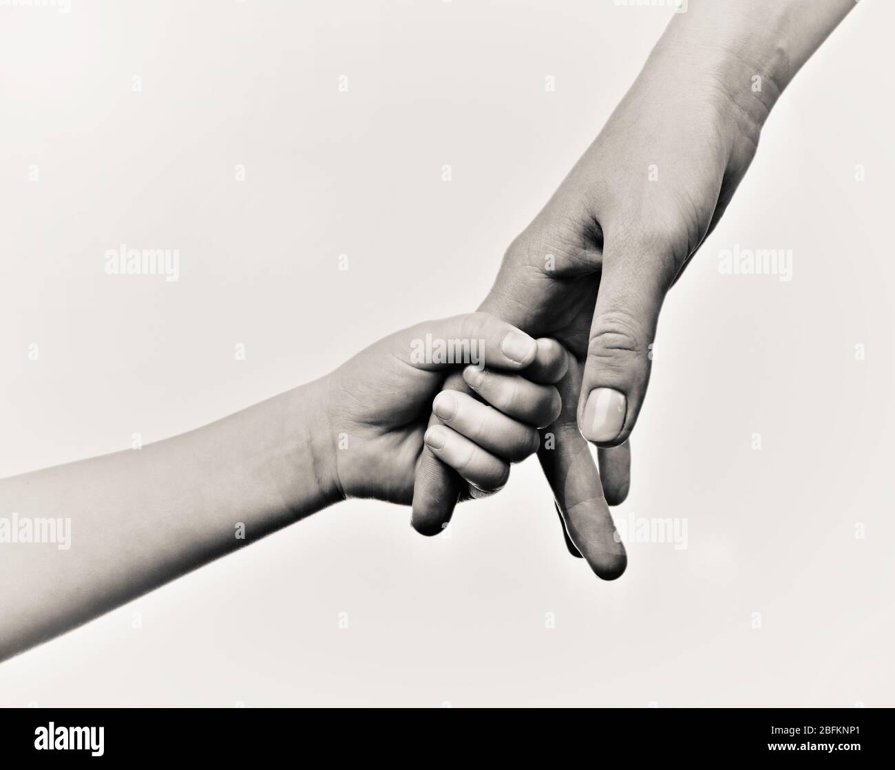 Child and mother hands, black and white retro stylization Stock Photo ...