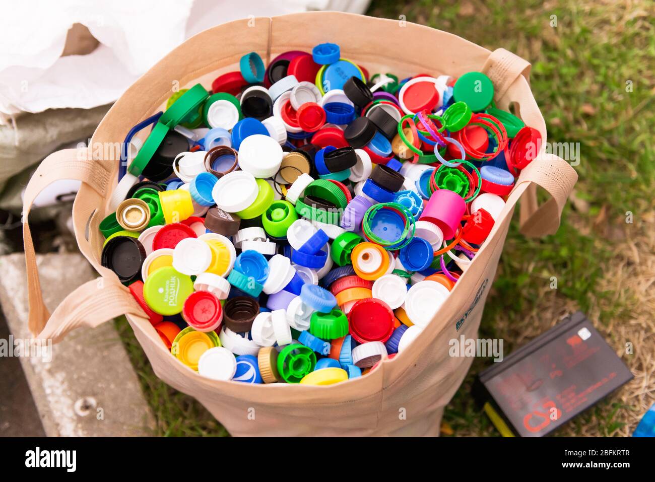 Plastic caps in a bag. Lots of plastic bottle caps. The campaign