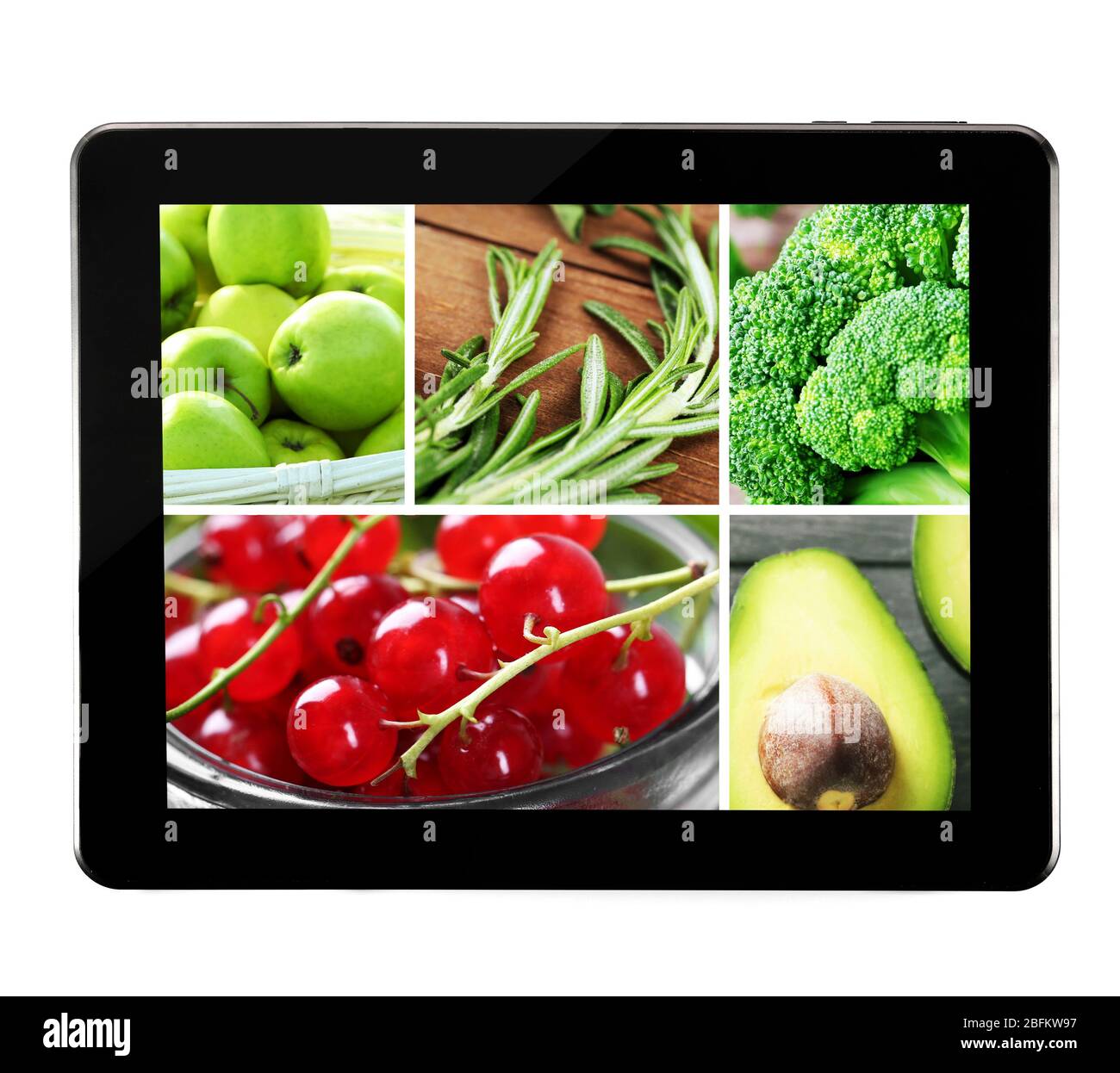 Tablet PC with images of nature objects, isolated on white Stock Photo