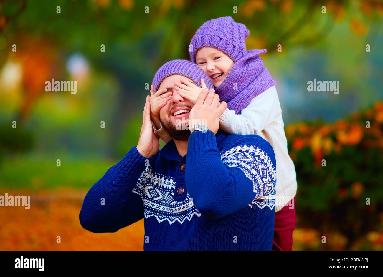 happy father and son playing in autumn park Stock Photo - Alamy