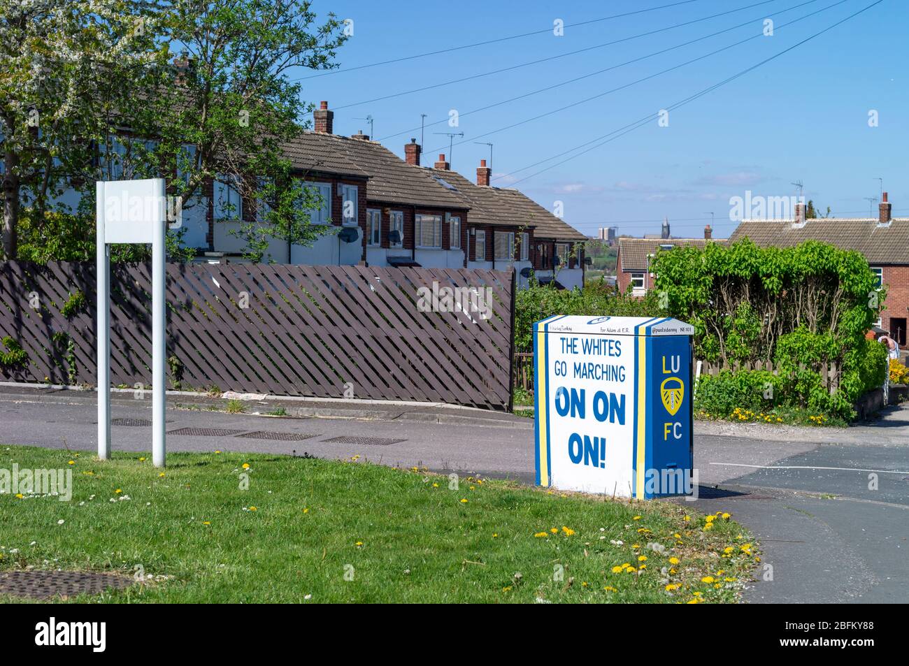 Schoolteacher Danny McVeigh has been nicknamed the Burley Banksy after decorating around a dozen electrical boxes near Elland Road and in other parts of Leeds. Memorial to Leeds United Footballer Norman Hunter (29 October 1943 – 17 April 2020). An English footballer who played for Leeds United, Bristol City, Barnsley and England. He was part of the 1966 FIFA World Cup winning squad, receiving a winner's medal in 2007. Hunter, who made 28 appearances for England  was admitted to hospital on Friday 10 April 20200with the coronavirus and died at teh age of 73 the following Friday 17 April. Stock Photo