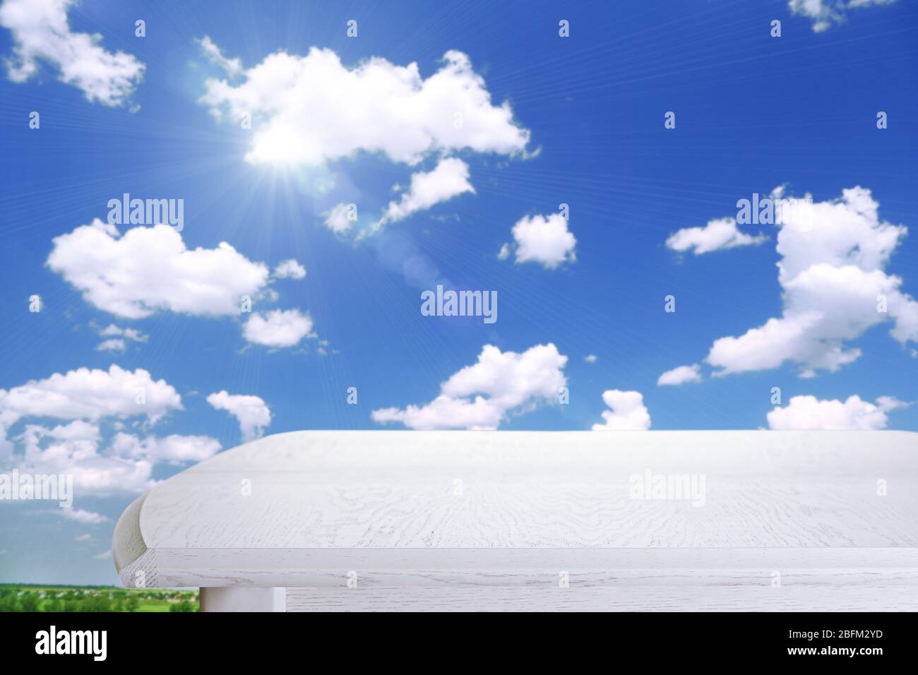 White wooden table on sky background Stock Photo