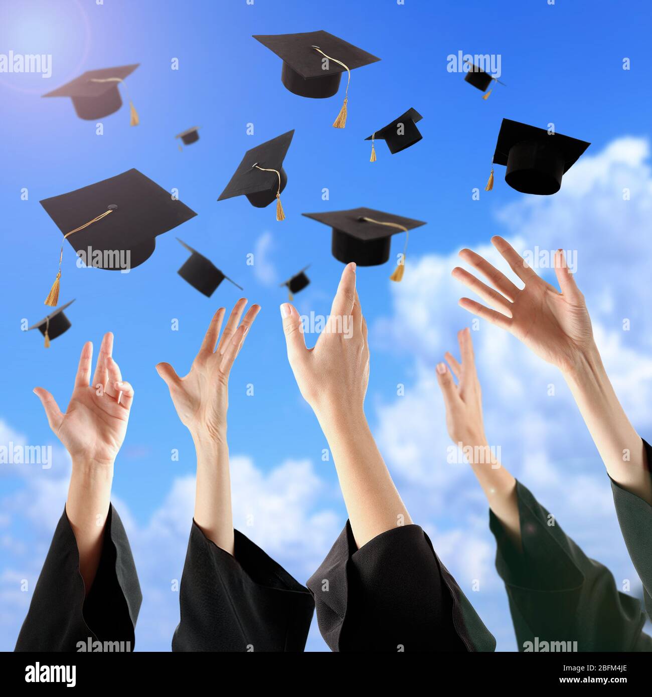 Graduation cap throwing hands hires stock photography and images Alamy