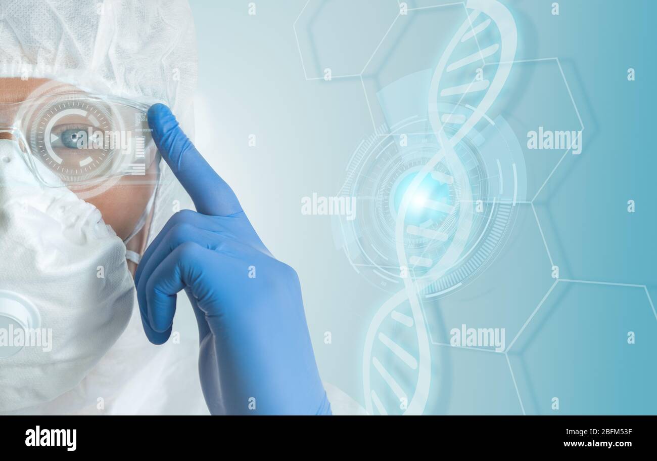Scientist in a protective suit with augmented reality glasses with a head up display. Genetic engineering and vaccine research Stock Photo