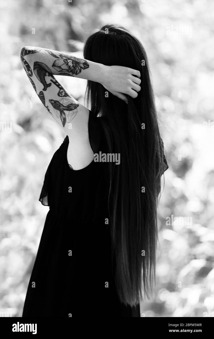 Tattoo and woman grey hair hi-res stock photography and images - Alamy