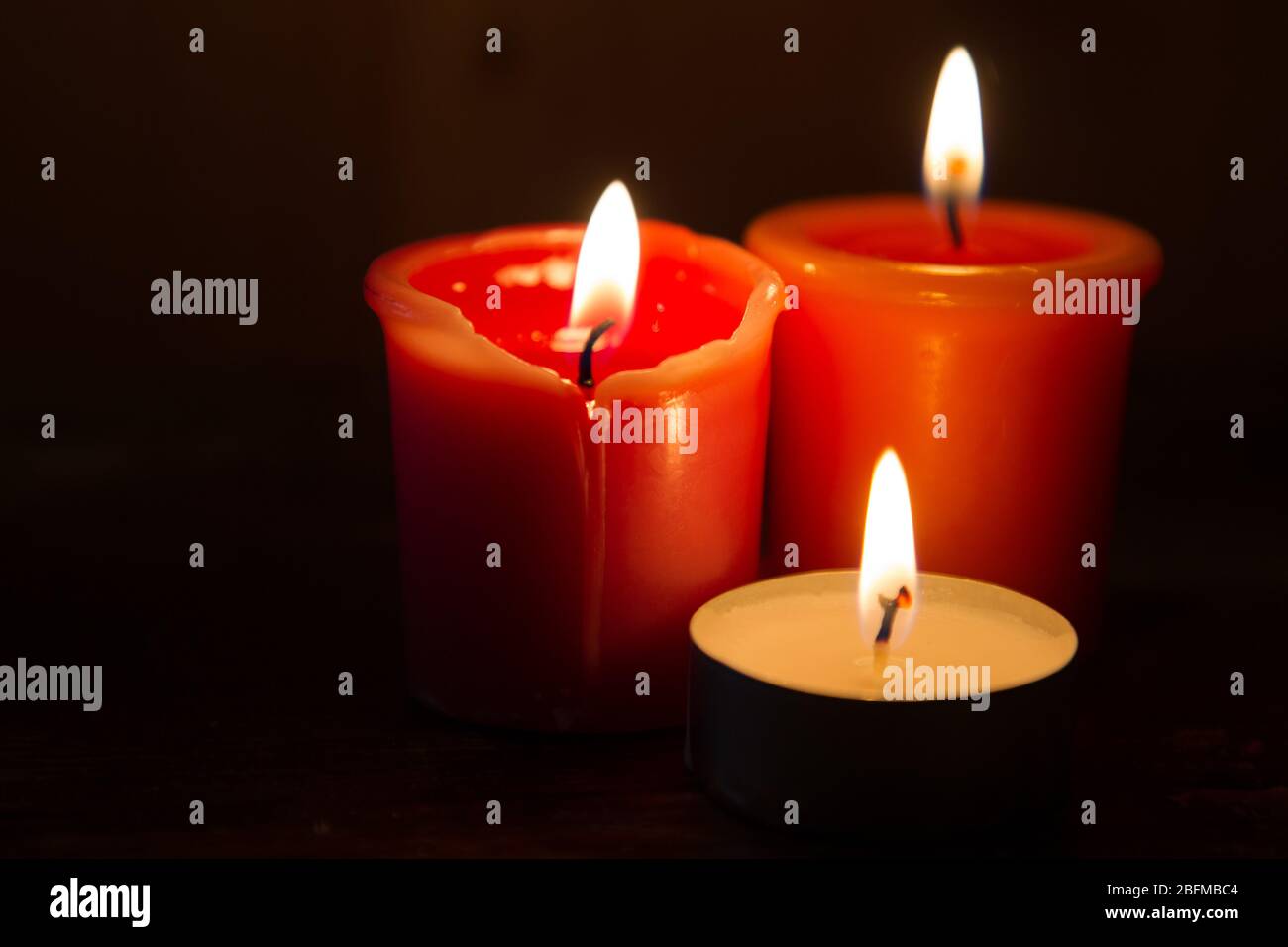 romantic lit candles for love events or spas Stock Photo