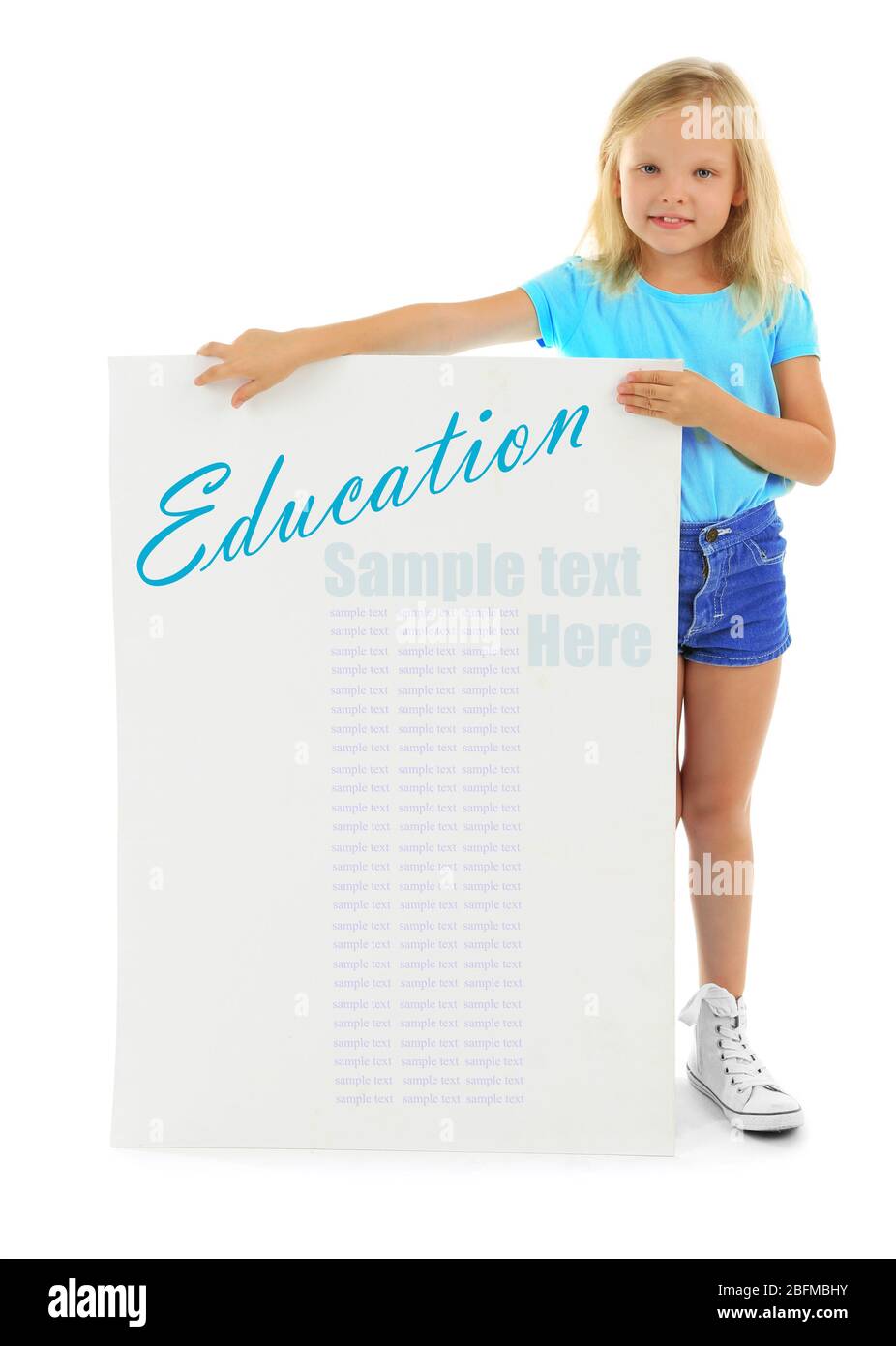 Cute school girl in causal with green blackboard for your text, isolated on white Stock Photo