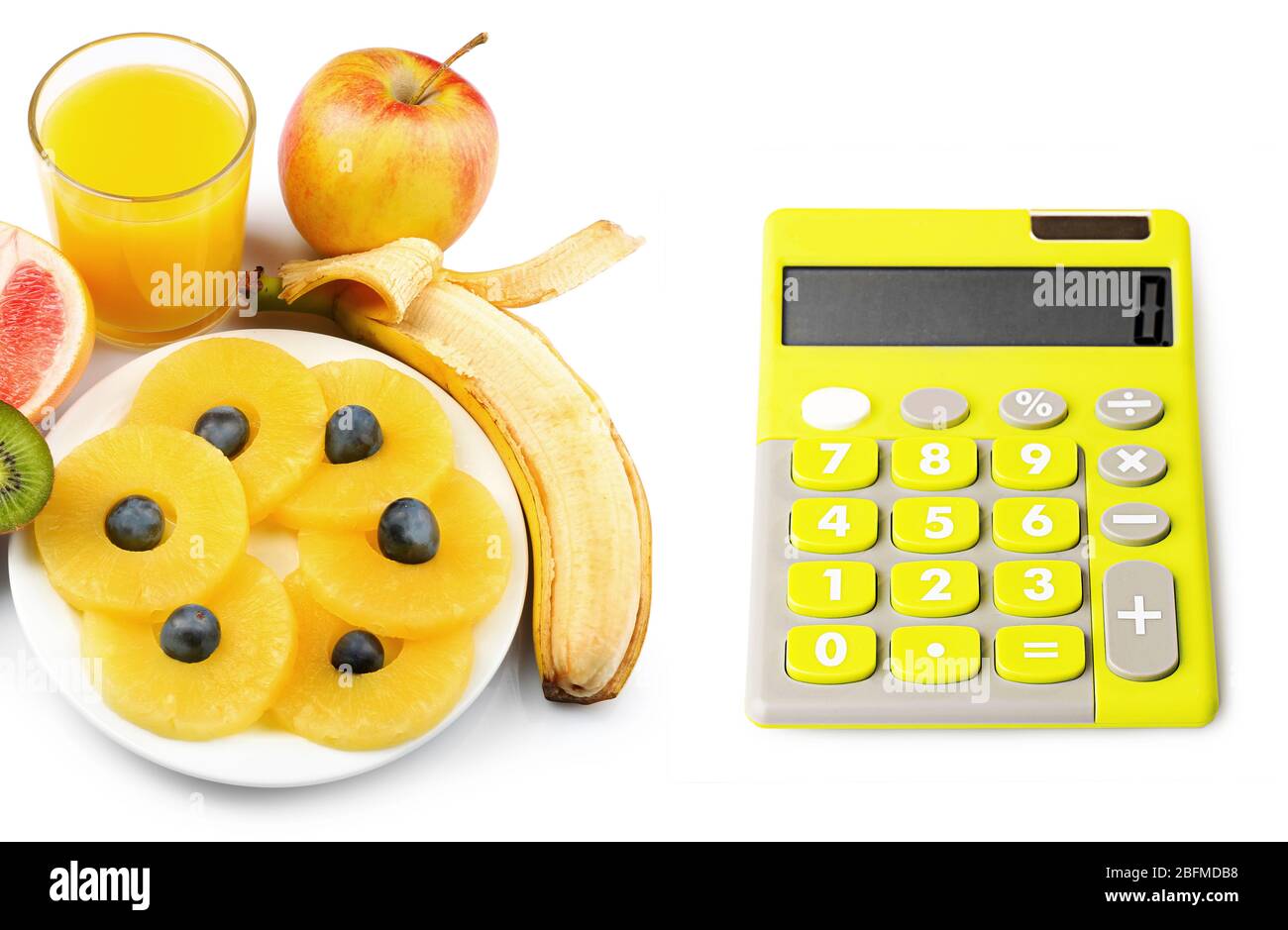 Calculator with fruits and juice isolated on white Stock Photo Alamy