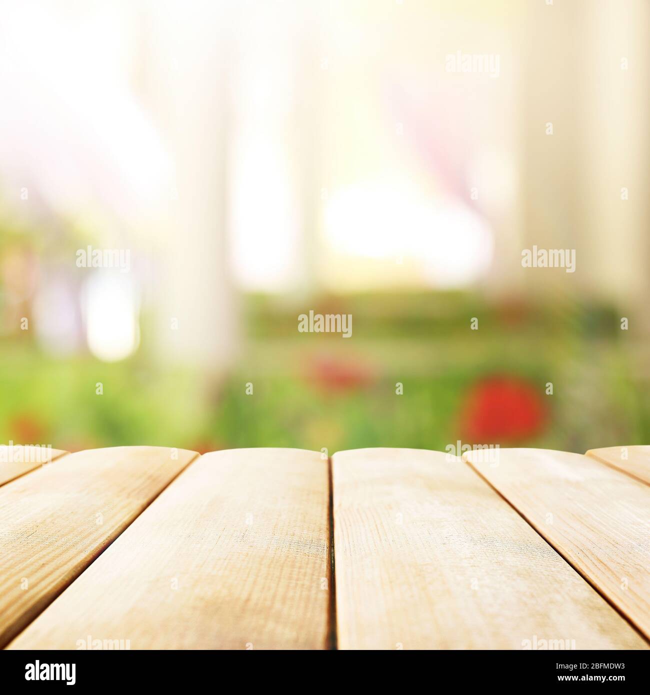 Empty wooden table and blurred cafe interior background Stock Photo - Alamy