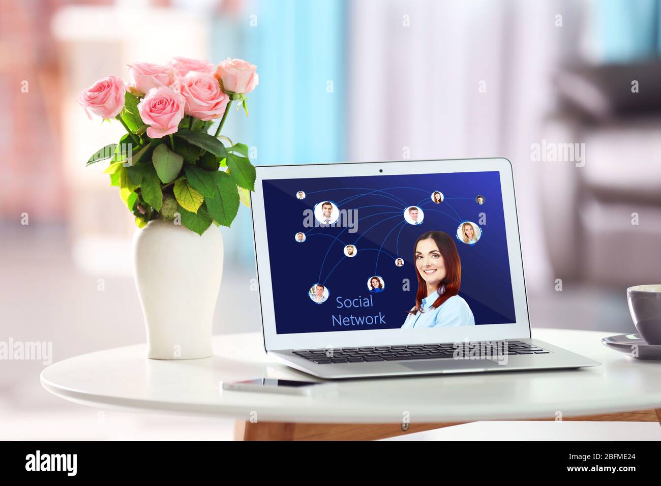 Laptop with social network structure on screen Stock Photo - Alamy