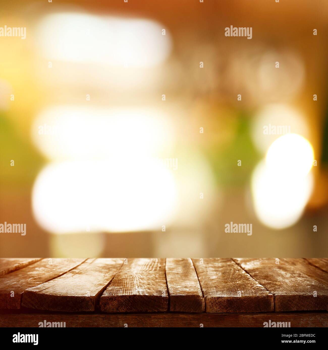 Empty wooden table and blurred cafe interior background Stock Photo - Alamy