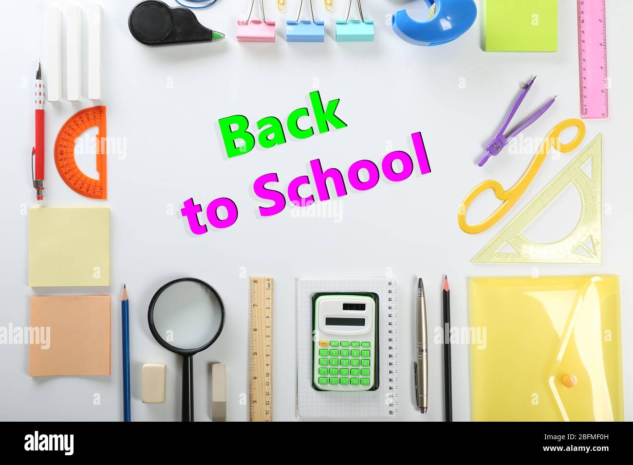 Back to school concept. Frame of colourful concept isolated on white background Stock Photo