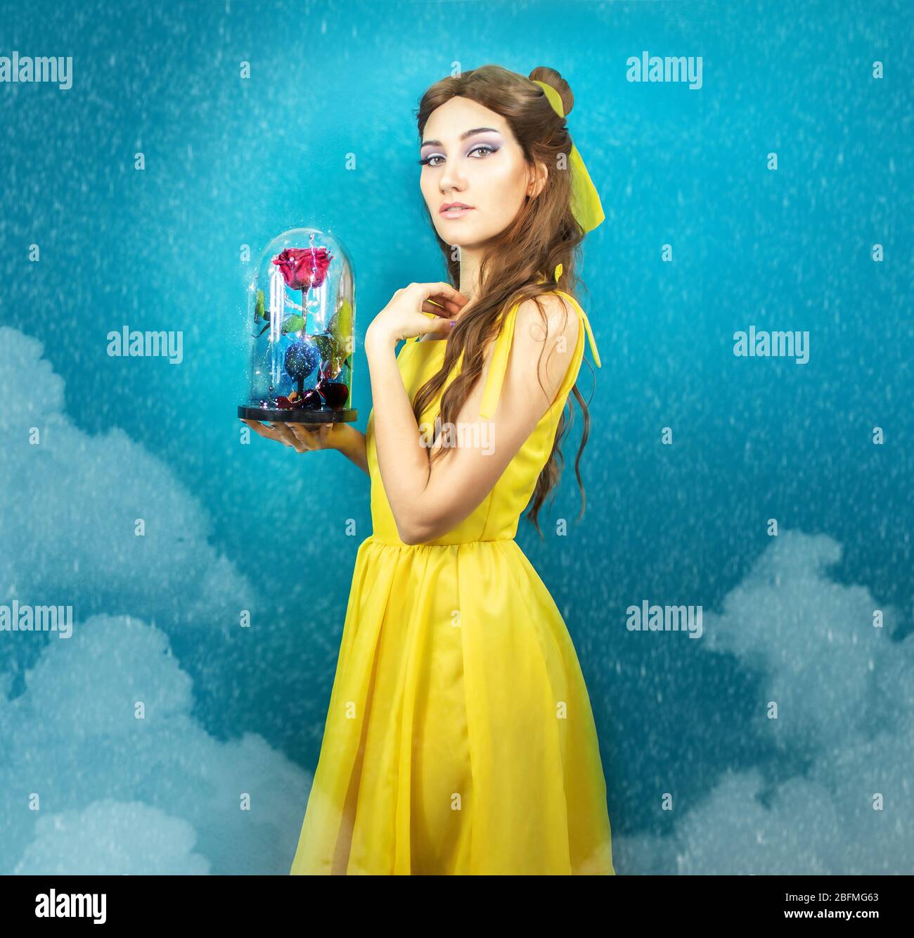 Pretty Woman In The Yellow Long Dress Closeup With Red Rose In Her Hands Beauty And The Beast Cosplay Art Processing Stock Photo Alamy