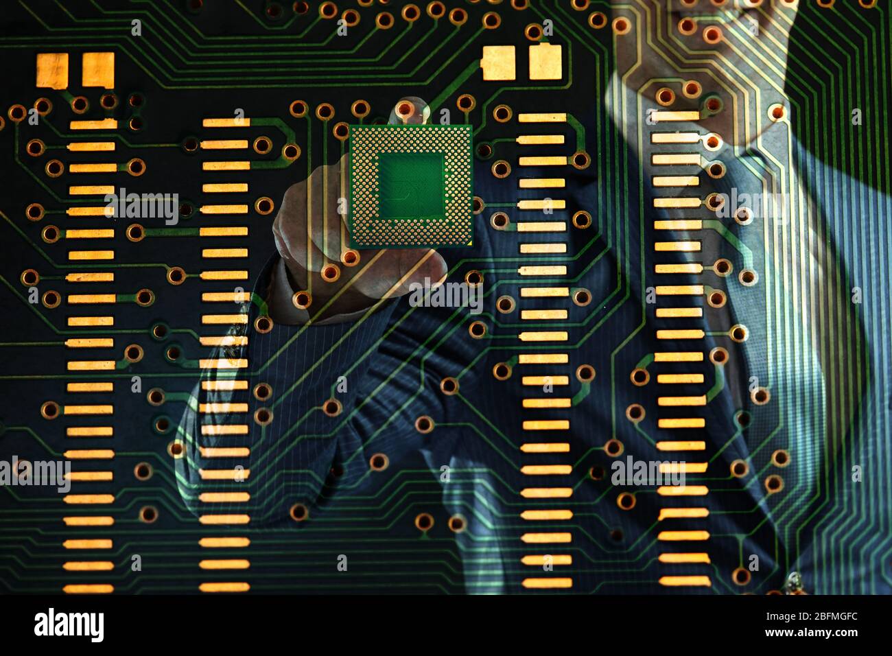 Man holding microchip and electronic circuit board, close up Stock ...