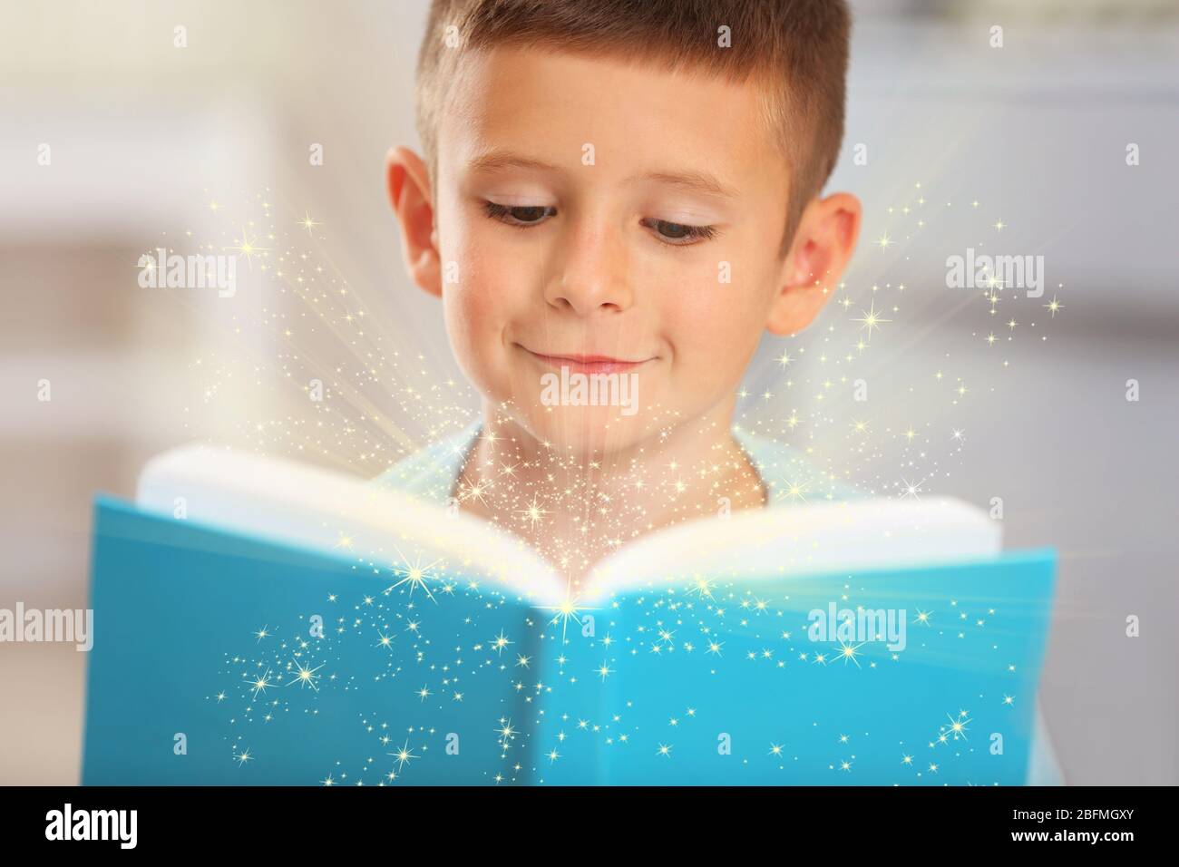 Child With Magic Book Stock Photo Alamy