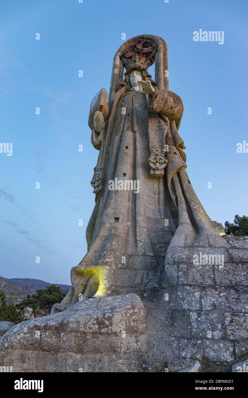 Statue of the Virgen de la Roca, an old construction from the year 1930 is a typical monument of the city of Bayona in Galicia, Spain. Stock Photo