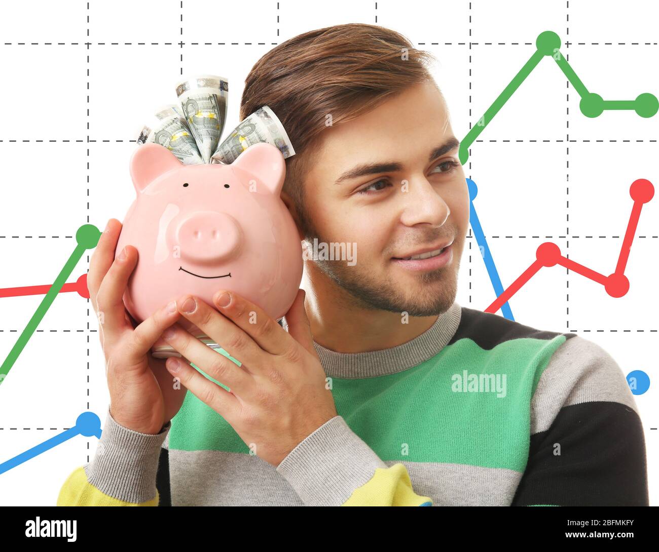 Business accounting concept. Man with money box and banknotes in it