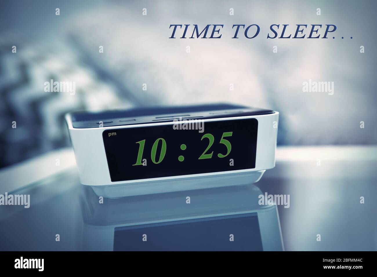 Digital Clock Showing 10 25 O Clock On A Bedside Table In Bedroom Stock Photo Alamy