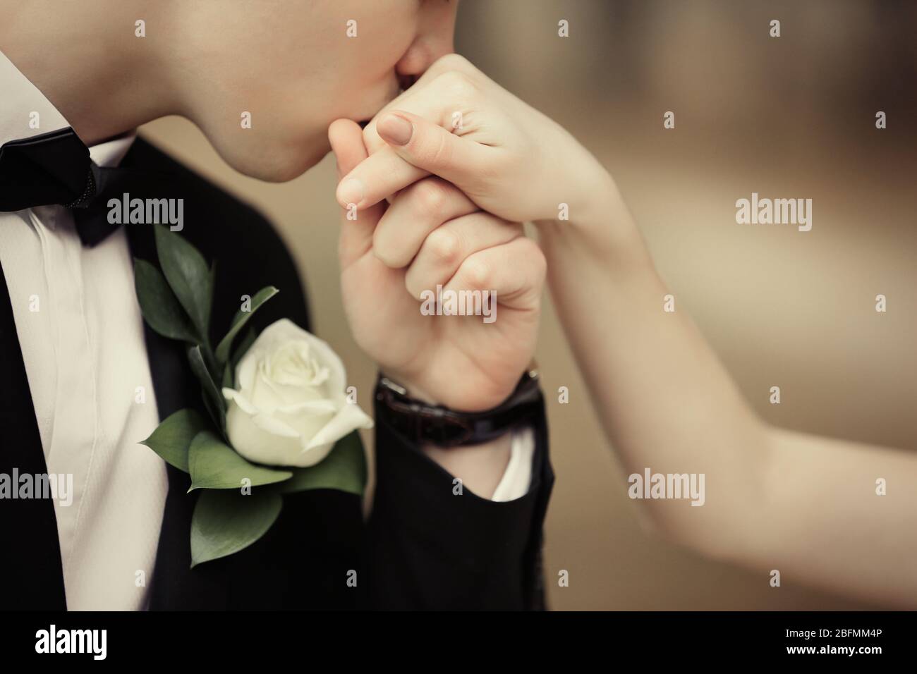 Man kissing woman hand retro hi-res stock photography and images - Alamy