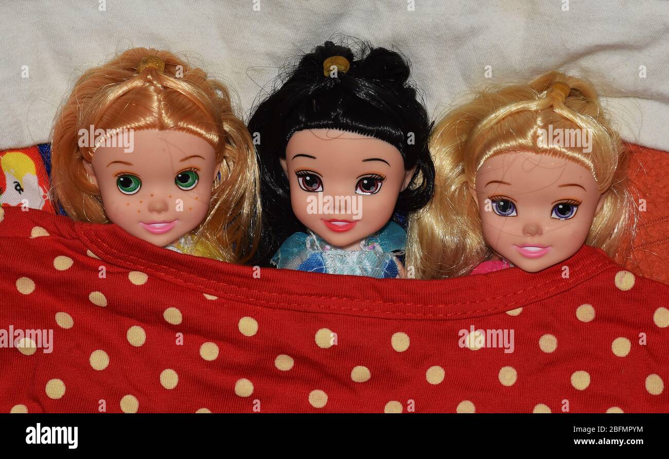 Close shot of Cute Dolls placed on bed. Dolls are referred as Gudiya in  India Stock Photo - Alamy