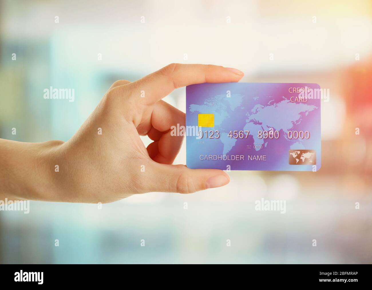 Hand holding credit card Stock Photo - Alamy