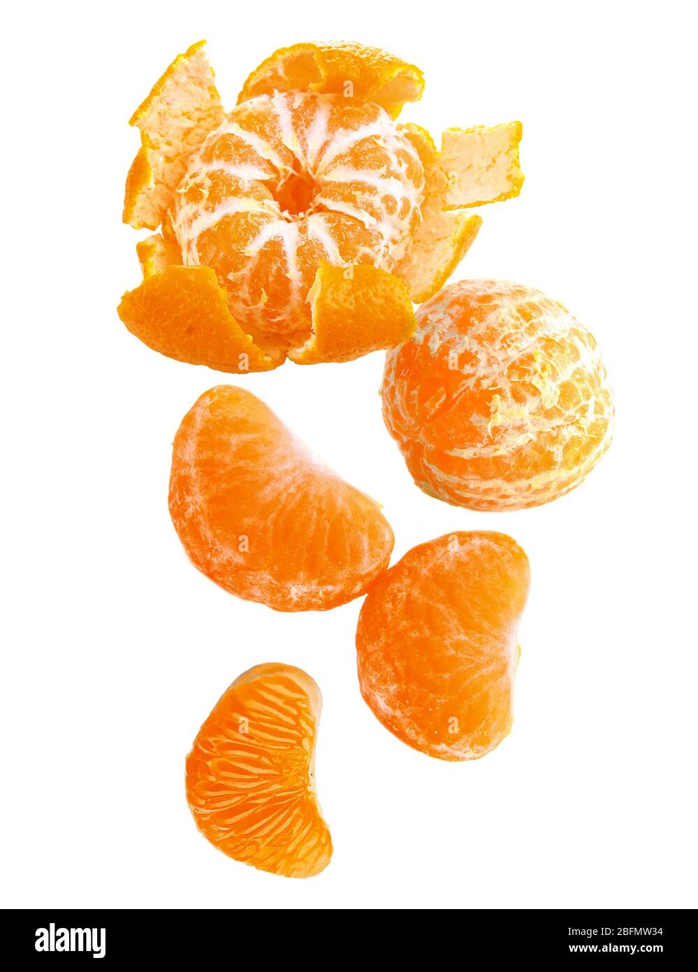 Falling tangerines isolated on white Stock Photo