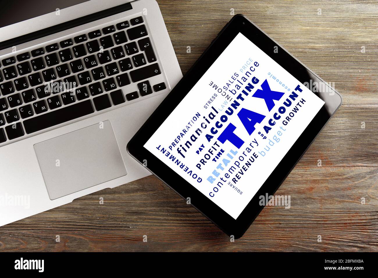 Tax concept silver laptop hi-res stock photography and images - Alamy