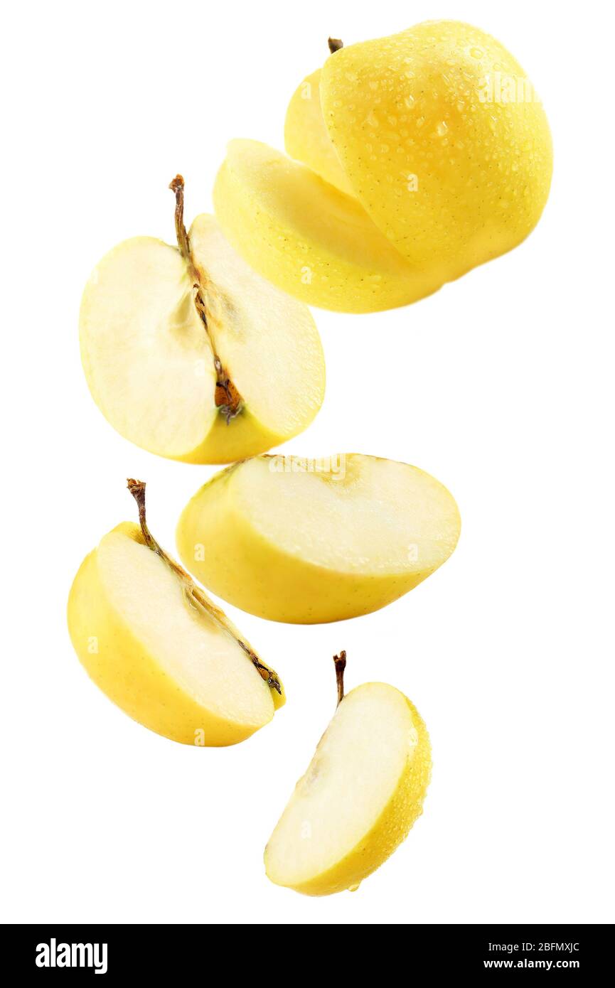 Falling ripe apples isolated on white Stock Photo