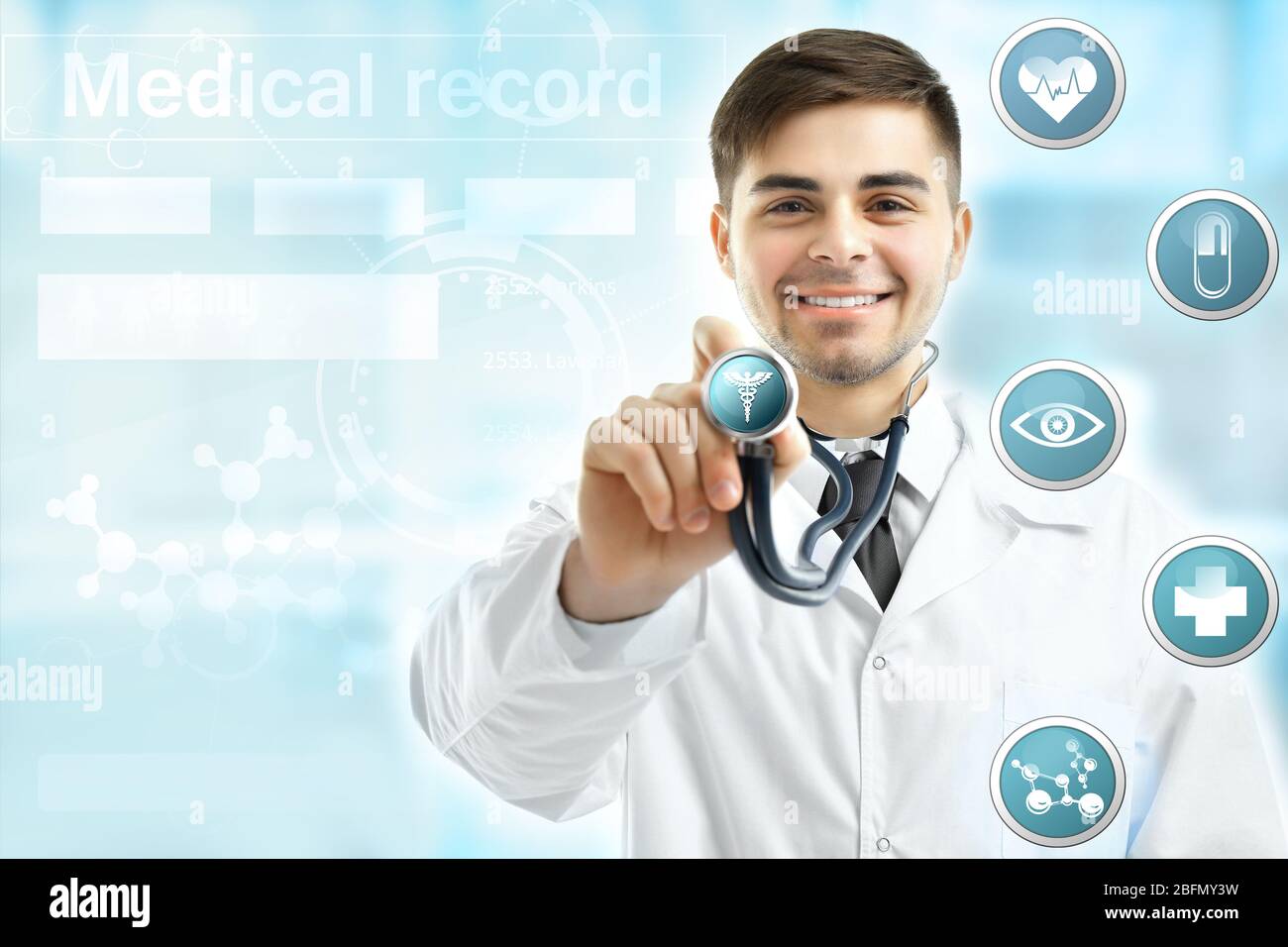 Male doctor with stethoscope and medicine icons on virtual screen. Medical  technology concept Stock Photo - Alamy