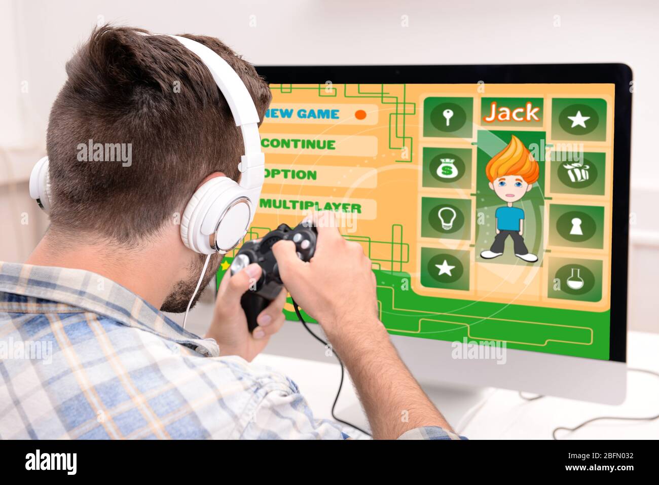 Young man playing computer games at home Stock Photo - Alamy