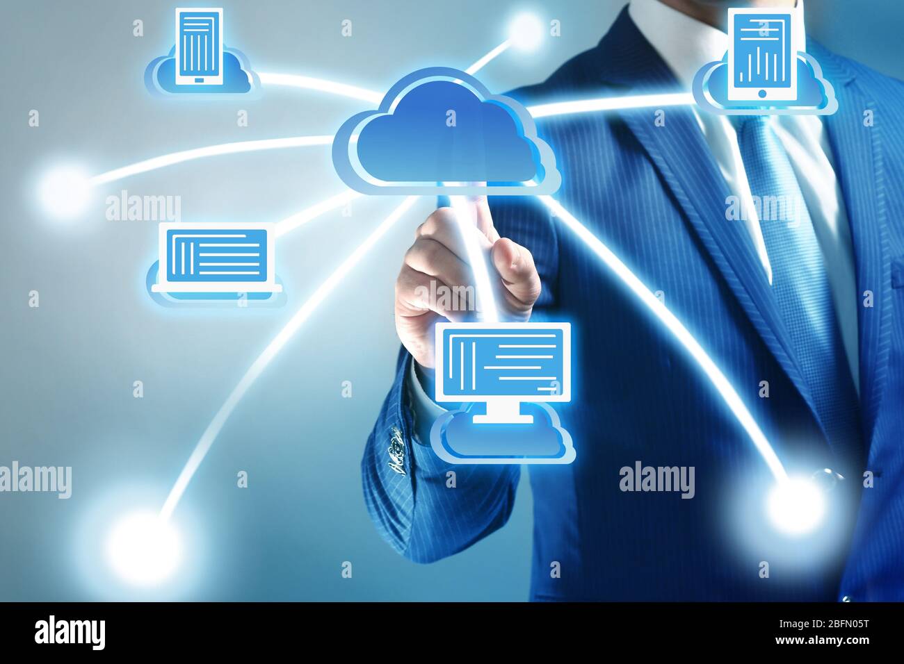 Man pushing touch cloud computing button on virtual screen Stock Photo