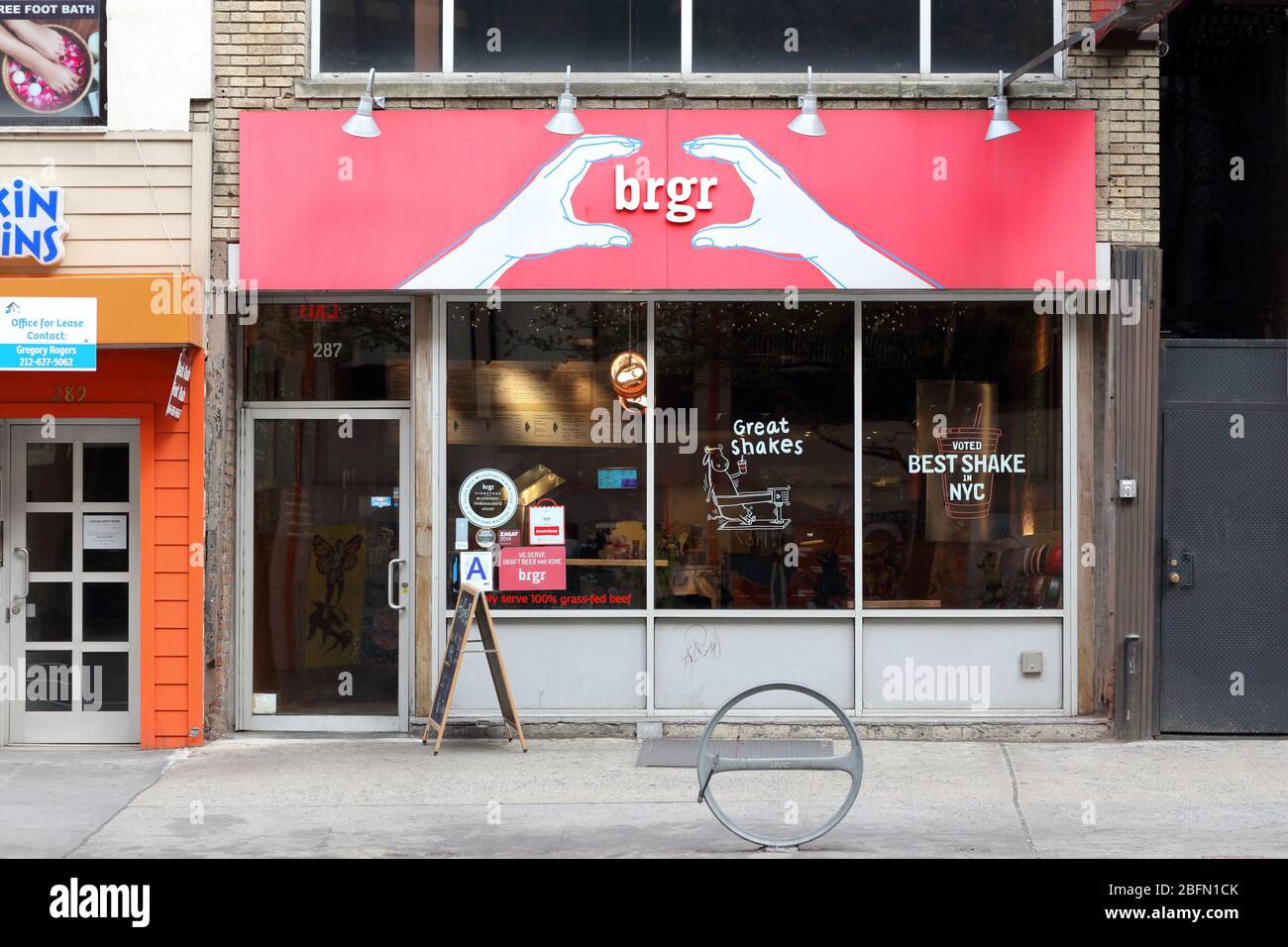 [historical storefront] brgr, 287 7th Ave, New York,NYC storefront photo of a hamburger and milk shake restaurant in Manhattan's Chelsea neighborhood Stock Photo