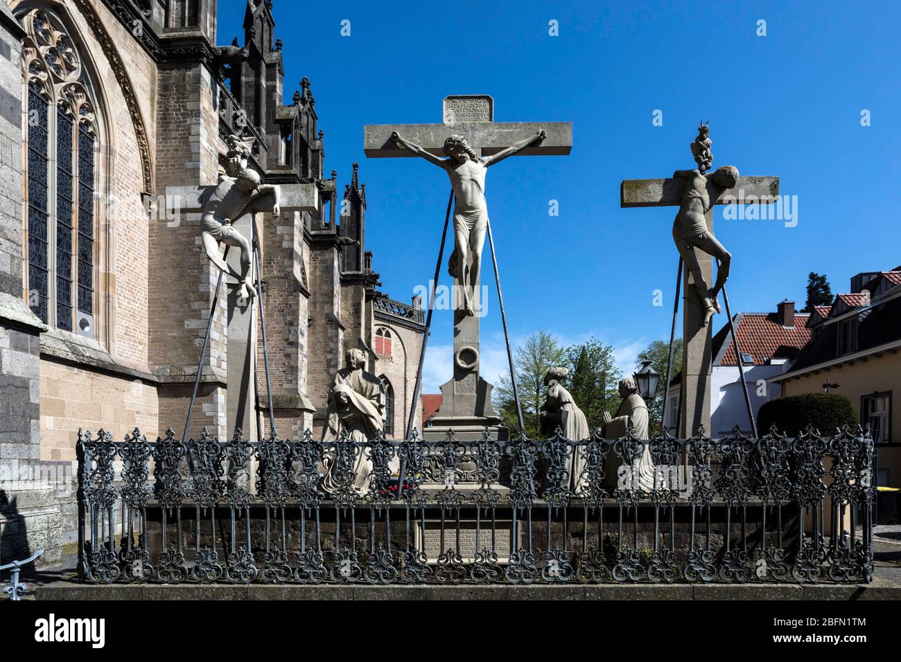 Sculptures of the crucifixion of Jesus next to the St. Victorian church Stock Photo
