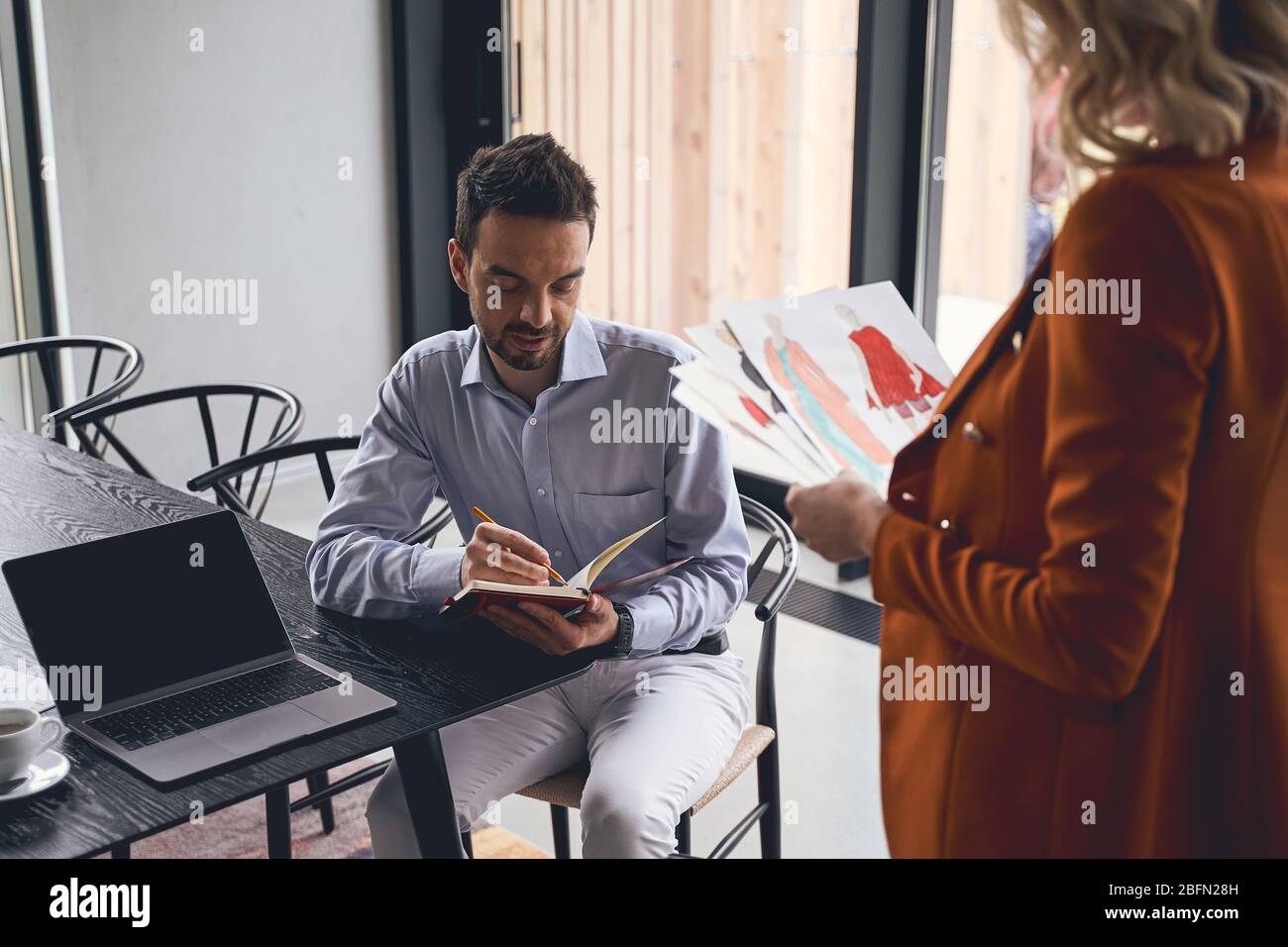 Two colleagues working together in a studio Stock Photo