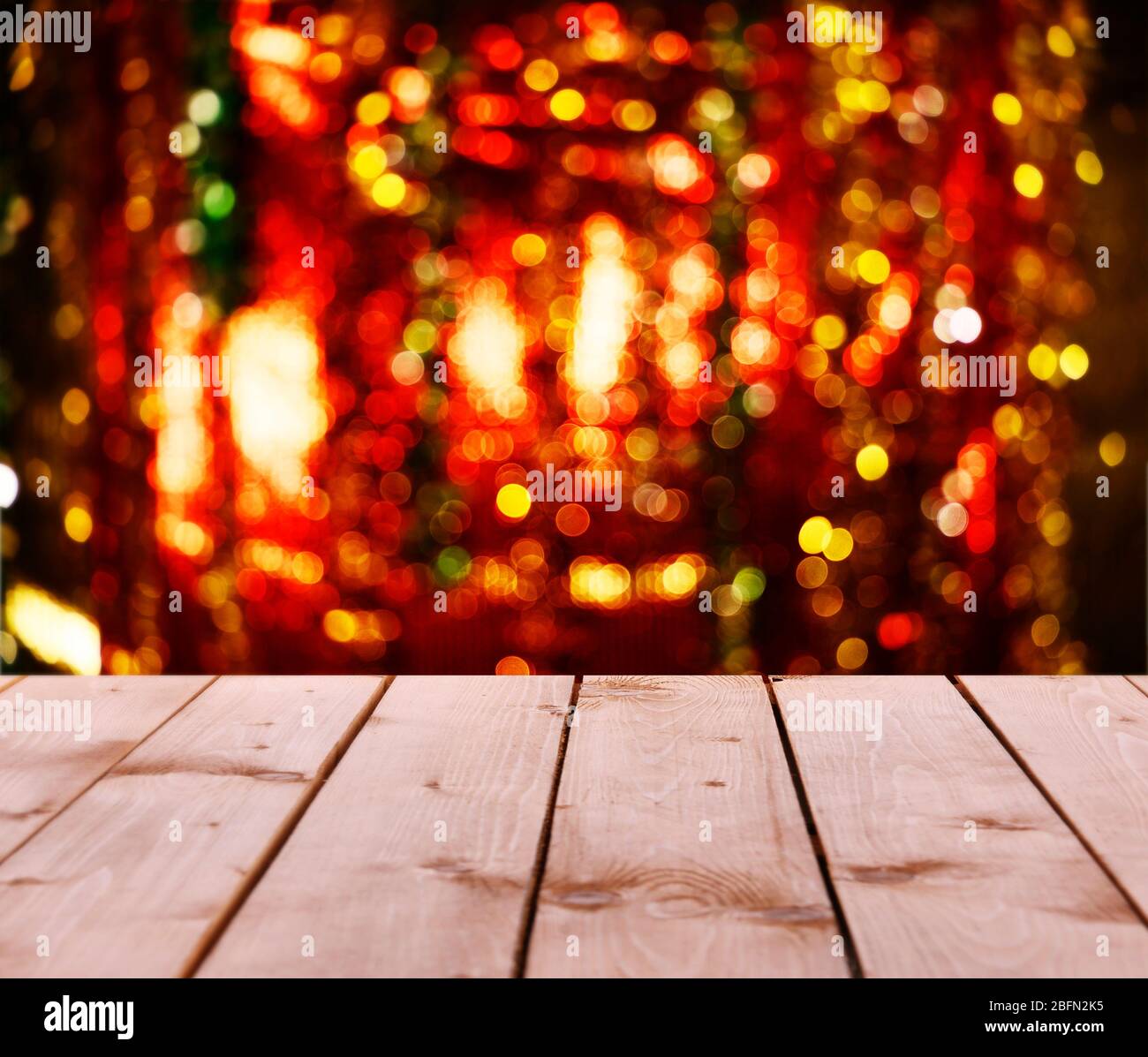Wooden table in front of blurred bokeh background Stock Photo - Alamy