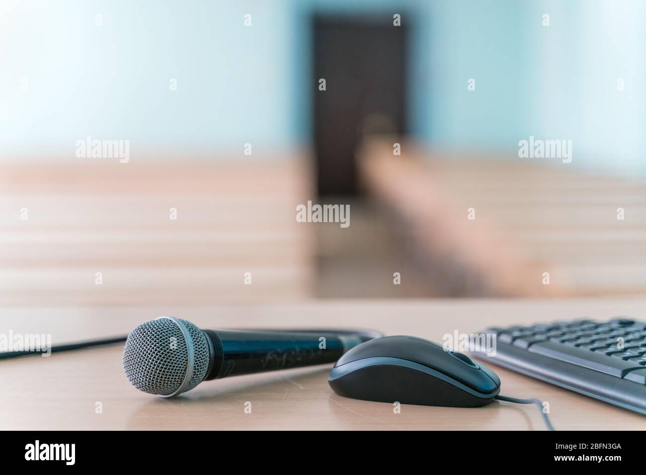 microphone on a table in an empty classroom for lectures at the university Stock Photo