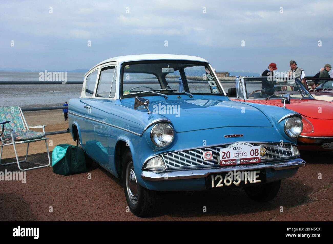 Ford Anglia 105E on seafront at end of 2008 Bradford to Morecambe classic car rally, Morecambe. Stock Photo