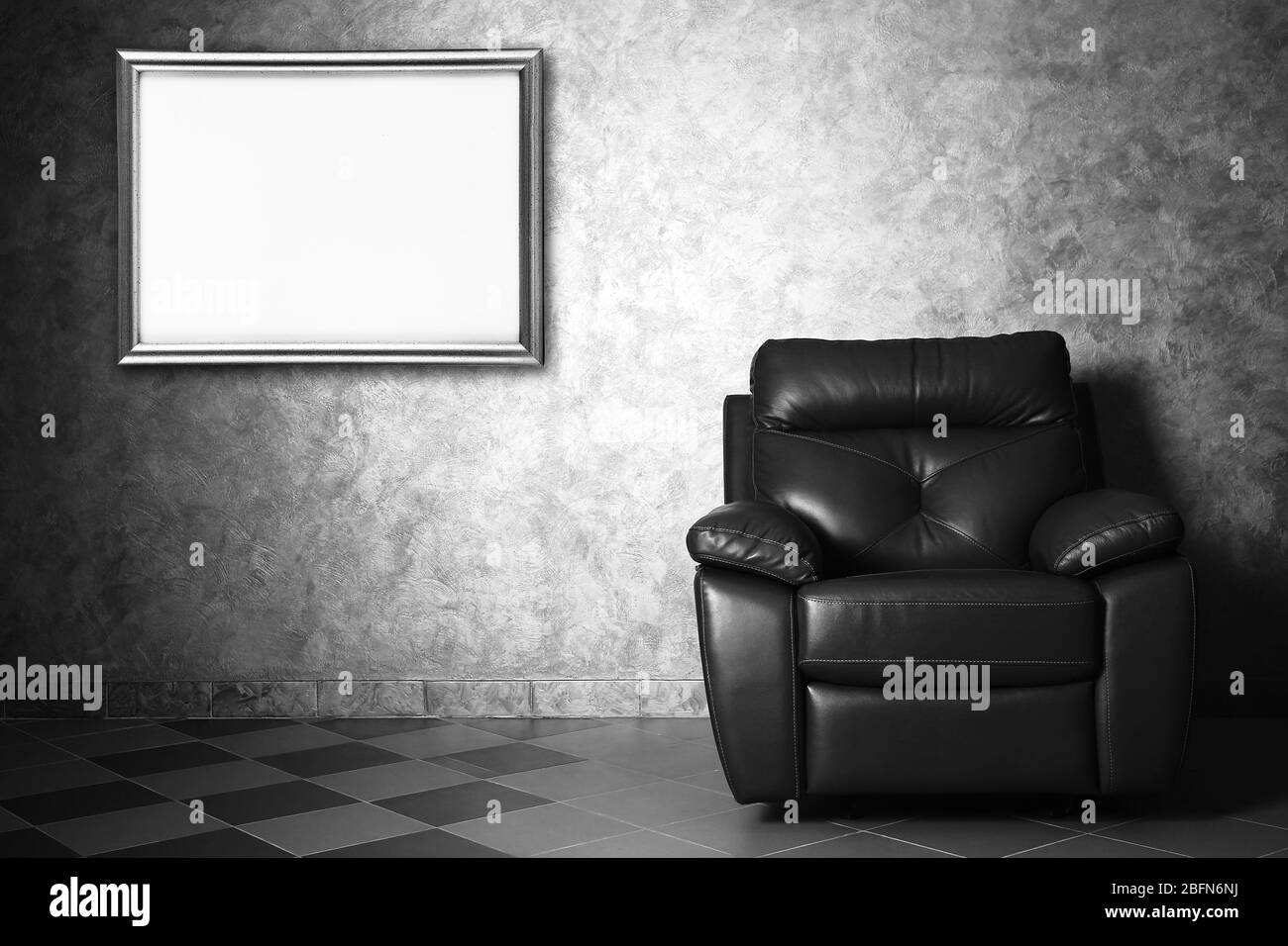 Modern leather chair and picture frame in the living room Stock Photo ...