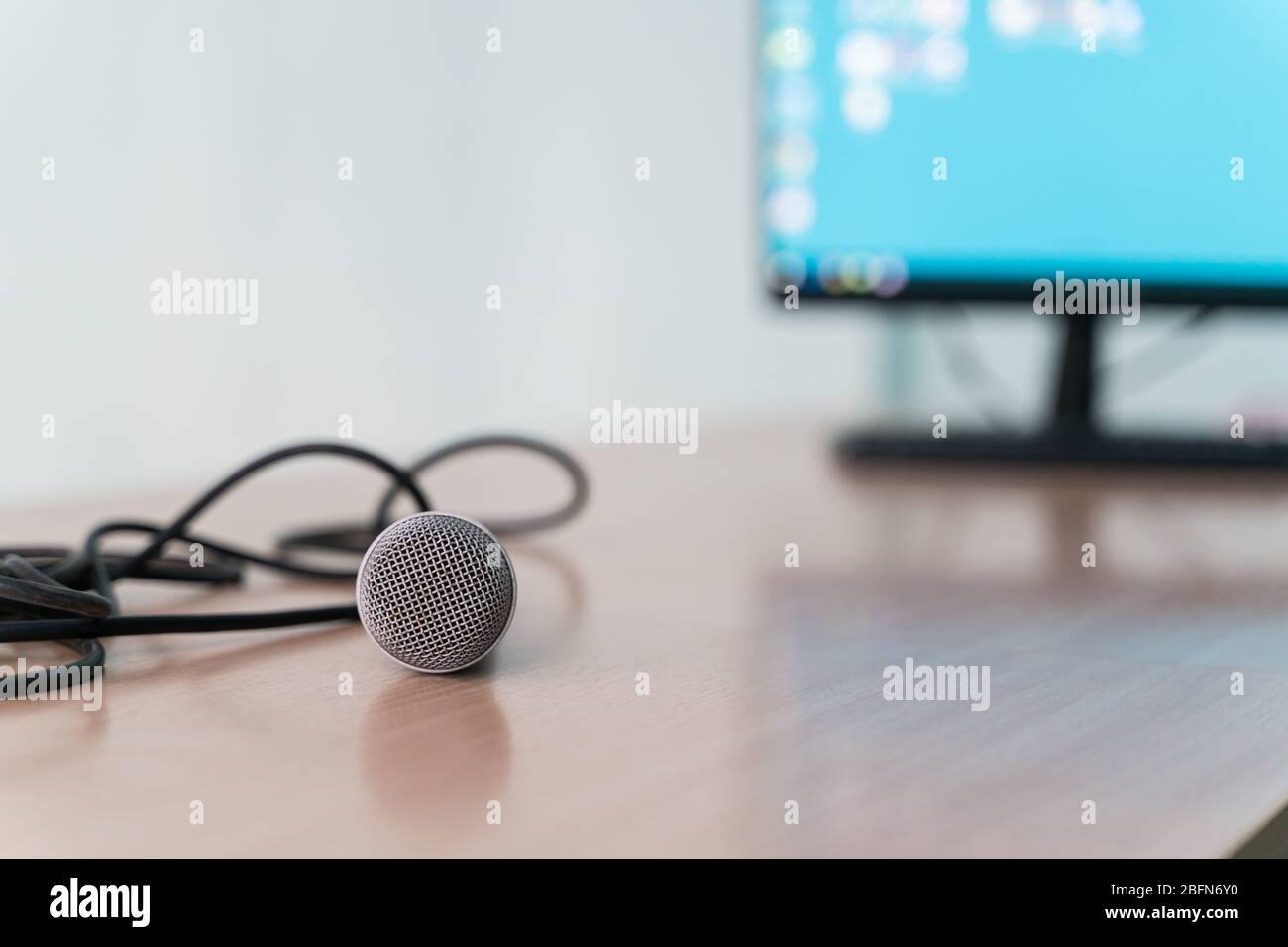 microphone on a table in an empty classroom for lectures Stock Photo