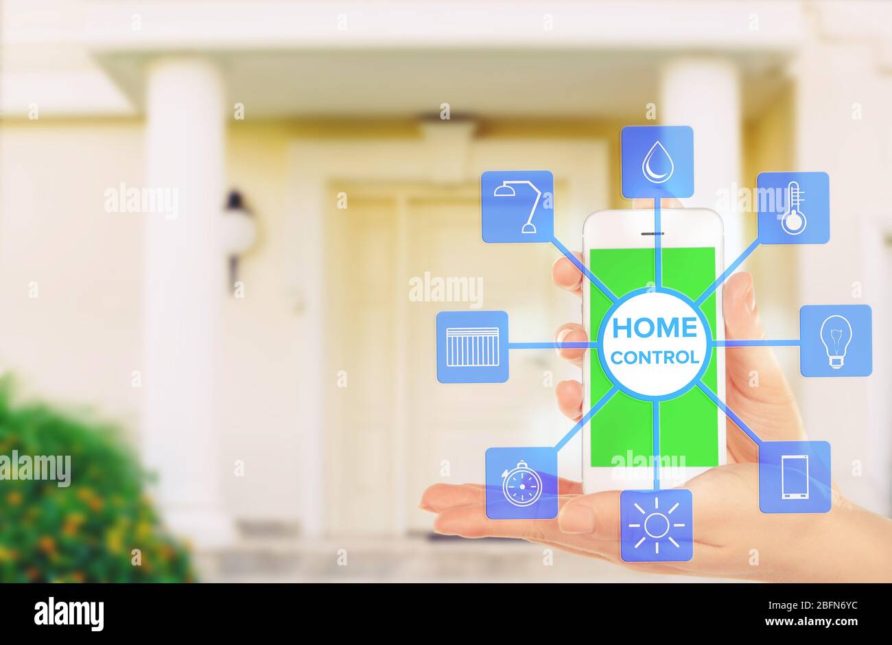 Using smart home app on phone. Smart home control concept Stock Photo ...